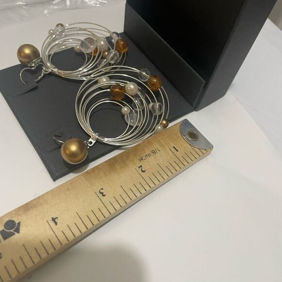 Subversive Silver Toned Hoop Earrings - Picture 6 of 8